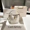 Una generación de cabello la popular nueva bolsa de cubo bordada china de este año 2025 Bolso de mano Guofeng para el día a día al por mayor