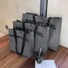 Tienda de Ropa Bolsas de Mano No Tejidas para Ropa de Mujer Empaque de Regalo Correas de Mano con Asa al Hombro Bolsas de Compras al por Mayor