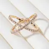 Suministro del fabricante: Anillo abierto tridimensional de cruz con doble perforación, anillo individual de moda elástico de moda totalmente pavonado con diamantes, personalizado