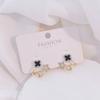 Exquisitos pendientes de pétalos de cuatro hojas con aguja de plata y estrella de cinco puntas con diamantes de imitación, pendientes de personalidad de moda, pendientes compactos y dulces al por mayor