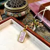Venta Caliente Nepal Tíbet Pintado a Mano Puro Thangka Colgante de Collar Zorro de Nueve Colas Conjunto Producto Terminado
