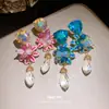 Brincos de agulha de prata com pingentes de gota d'água floral com aplicação de óleo e cravejados de diamantes, brincos de estilo infantil fresco e doce, brincos com sensação de luxo leve e de alta qualidade