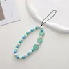 Nueva cadena para teléfono con cuentas en forma de corazón con accesorios de corazón de madera, funda de teléfono anticaída y colgante antipérdida, correa para la muñeca