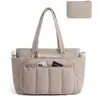 Bolso tote para mujer con correa para equipaje integrada, múltiples bolsillos, adecuado para la oficina y viajes de negocios, viene con una bolsa de almacenamiento para maquillaje a juego