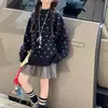 Suéter para Niña Otoño Invierno 2026 Estampado de Lunares Franceses Pulóver Moda para Niña Estilo Perezoso Tejidos Venta al por Mayor Transfronteriza