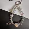 Cadena de Teléfono Móvil de Lujo Ligero Amor Lanyard Corto para Teléfono Móvil Llavero con Colgante de Perlas de Cristal Muñequera de Alta Gama Chica