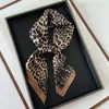 Bufanda de seda con estampado de leopardo de moda transfronteriza, sentido de alta calidad, bufanda cuadrada de 70, bufanda para el cuello, bufanda profesional, pañuelo para la cabeza, venta al por mayor, verano