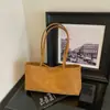 Bolso cruzado de un solo hombro personalizado estilo coreano, bolso de mano casual de color liso, nuevo bolso tote grande de gran capacidad para el trabajo, principios de otoño 2026