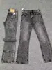 Jeans Red Label 517 com estampa de mármore, corte cleanfit, estilo high street, lavado, perna reta com leve boca de sino e vibe vintage