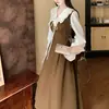 Vestido elegante de outono para tamanhos grandes, estilo francês, com blocos de cor, falso duas peças, gola boneca, para mulheres, cintura marcada, corte A, longo, transfronteiriço