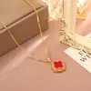 Aretes y collar de trébol de cuatro hojas rojo con circonita, lujo ligero, alta moda, aretes elegantes y con estilo