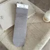 Calcetines de maternidad versátiles sin costuras de principios de otoño, calcetines casuales de algodón hasta la pantorrilla con efecto holgado, calcetines largos de color liso estilo ins para niñas en tonos café