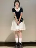 Falda Midi Blanca Calada Estilo Francés para Mujer, Primavera 2026, Cintura Alta, Corte Holgado, Versátil, Adelgazante, Adecuada para Figuras Pequeñas, Falda de Corte A