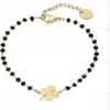 Pulsera de Trébol de Cuatro Hojas Galvanizado Moda Pulsera de Pareja Pulsera con Cuentas de Vidrio Negro Multifacético Colgante de Corazón