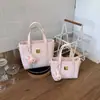Bolso de Mano con Relieve de Alto Valor Estético 2026 Primavera/Verano Nuevo Bolso Cruzado Casual Elegante Bolso Cubo de Mano de Moda Tendencia
