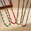Cadena de suéter larga en capas con cuentas irregulares de cristal de concha estilo europeo y americano, estilo navideño, collar retro personalizado de alta gama