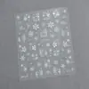 Adesivos de Unha Artística de Natal Novos Transfronteiriços Árvore de Natal Popular Estampagem a Quente Floco de Neve Estrela Laço Decorações de Unha
