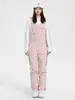 Liquidación de pantalones de esquí tipo peto para mujer, nuevos, impermeables y cálidos, chaqueta de esquí profesional para hombre, comercio exterior
