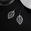 E614 Venda Direta da Fábrica Yiwu Brincos de Metal Folha Estilo Floresta Moda Criativa Europeia e Americana Studs e Pendentes