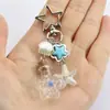 Colgante de Llave de Botella de Deseos de Estrella Transparente Creativo Transfronterizo Trébol de Cuatro Hojas Copo de Nieve Mariposa Botella a la Deriva Colgante de Bolsa
