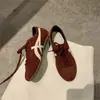 Zapatillas de entrenamiento alemanas de suela plana para mujer 2026 nuevo estilo verano otoño rojo casual deportivas para mujer zapatillas Forrest Gump superventas zapatillas tipo papá