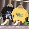 Camiseta interior básica de algodón puro para niños, camiseta de manga larga para primavera y otoño para niños, corte holgado, nueva colección primavera 2026 para niños, top falso de dos piezas