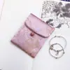 Muestra de pedido final se puede pedir bolsa de tela de brocado para regalo bolsa Wenwan estilo japonés bolsa de almacenamiento de joyas billetera plegable tela