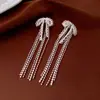 Estilo Lujo Ligero Francés Pendientes de Plata con Zirconita de Lazo y Borla Exquisitos Elegantes Versátiles Pendientes de Botón Moda Accesorios de Pendientes de Temperamento