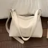Bolso de Axila de Gama Alta de Nicho para Mujer 2026 Nuevo Bolso Dumpling de Verano para Viajar Bolso Cruzado de Hombro de Moda Transfronterizo