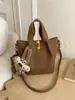 Bolso Cubo Retro Texturizado Estilo Coreano para Mujer Otoño e Invierno 2025 Nuevo Nicho Lujo Accesible Versátil Estilo Extranjero Bolso de Hombro Único Cruzado
