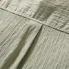 Camisa de manga corta con textura de rayas verticales para hombre, corte holgado, ambiente veraniego, marca de moda, color liso, camisa casual con cuello versátil