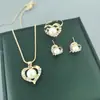Europa y los Estados Unidos transfronterizos moda nuevo diseño creativo alto sentido punto diamante cuadrado imitación perla pendientes anillo collar traje