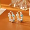 Pendientes turquesa en forma de U estilo retro de alta gama moda exquisitos elegantes pendientes de temperamento para mujeres personalidad tachuelas estilo INS