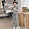 Traje de verano para niña Estilo nuevo Niña Niño grande Nuevo estilo chino Estilo nacional Conjunto de dos piezas de manga corta Moda de verano para dama Moderno