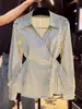 Camisa de Rayas Estilo Francés para Mujer Otoño 2025 Nueva Ajustada Cintura Irregular Manga Larga Camisa Top Chic de Nicho