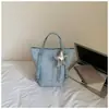 Mochila escolar grande de estudiante estilo coreano ins estrella para ir al trabajo 2026 nuevo modelo bolso tote casual chic de un solo hombro