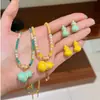 Collar de Cadena Larga de Lana Elegante Versátil de Moda Retro con Borla Letra Calavera de Calabaza Lujo Ligero Nicho Exquisito para Mujer