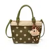 Bolso tipo cubo casual estilo coreano, nuevo bolso de mano otoño e invierno 2026, bolso de hombro y cruzado de moda con lunares único