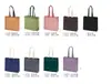 Bolsa de mão não tecida em estoque com LOGO estampado bolsa para roupas da moda bolsa para sapatos embalagem bolsa de presente bolsa com nome da loja estampado
