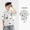 Camiseta tipo polo de manga corta para niño Duoduo 2026 Ligera estilo verano Infantil Dinosaurio Estampado completo Manga media Top para niño