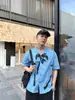 Cita de Verano en la Isla: Camisa Casual Suelta de Manga Corta Azul Estilo Resort Estampada con Cuello Cubano para Hombre