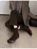 Temperamento delgado fondo plano otoño e invierno simple Martin para commuting punta redonda empalme de gamuza sin cordones botas ajustadas adelgazantes botines cortos mujer 2026