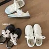 Zapatillas de entrenamiento alemanas de alta moda populares para mujer, nuevas zapatillas de otoño 2026, zapatos casuales versátiles de nicho con suela gruesa