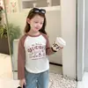 26 Camiseta de Algodão Puro com Manga Raglan para Crianças, Nova Blusa de Manga Longa de Outono para Meninas, Respirável, Elástica, Confortável Camiseta Básica