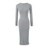 Vestido de Punto Francés de Cuello Redondo y Manga Larga para Mujer Otoño 2026 Nuevo Estilo Elegante Adelgazante Capa Base Falda Dividida que se Ajusta a la Cadera