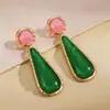 Brincos redondos de resina em formato de gota transfronteiriços europeus e americanos, elegantes, modernos, únicos, brincos exagerados com design de nicho para mulheres