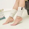 Botas de moda europeas y americanas lana tejida pierna corta botón de giro calcetines botas de rodilla venta al por mayor directa de fábrica