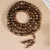 Pulsera de cuentas de oración budistas de madera de agar de Brunéi, 108 cuentas, joyería decorativa para hombres y mujeres, accesorio de cuentas redondas de múltiples hilos