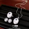 Set de aretes, collar y anillo de circonia con aguja de plata transfronterizo, joyería de alta gama de lujo ligero con un toque exquisito y elegante