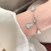 2025 nuevo exquisito pulsera de calabaza de lirio blanco luna pulsera de diamante de alta calidad diseño de nicho de lujo ligero